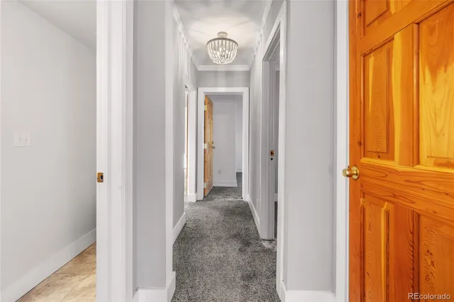 a view of a hallway with windows