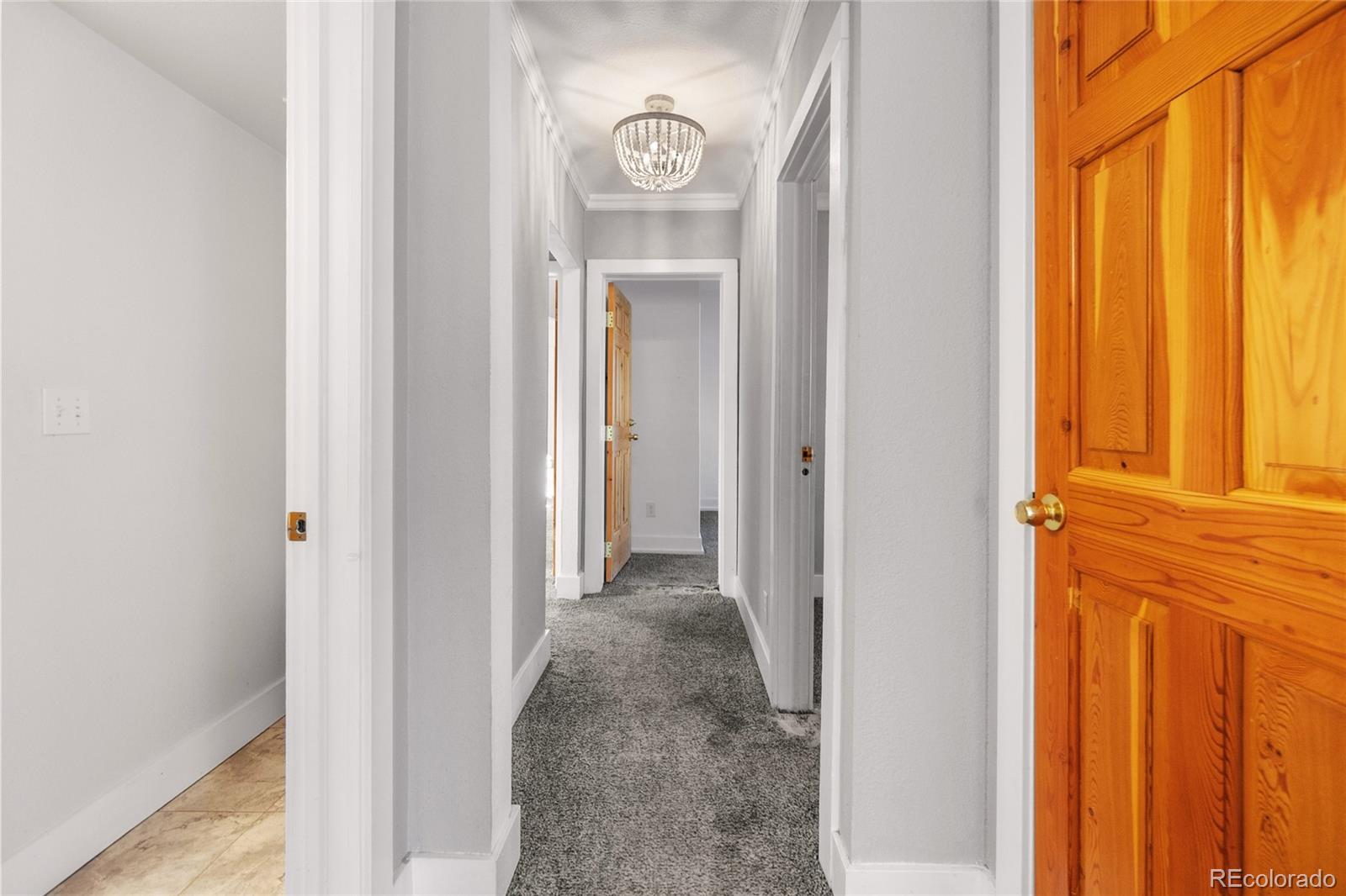 375 Main Street Elizabeth, CO 80107 - Photo 18 of 43 a view of a hallway with windows