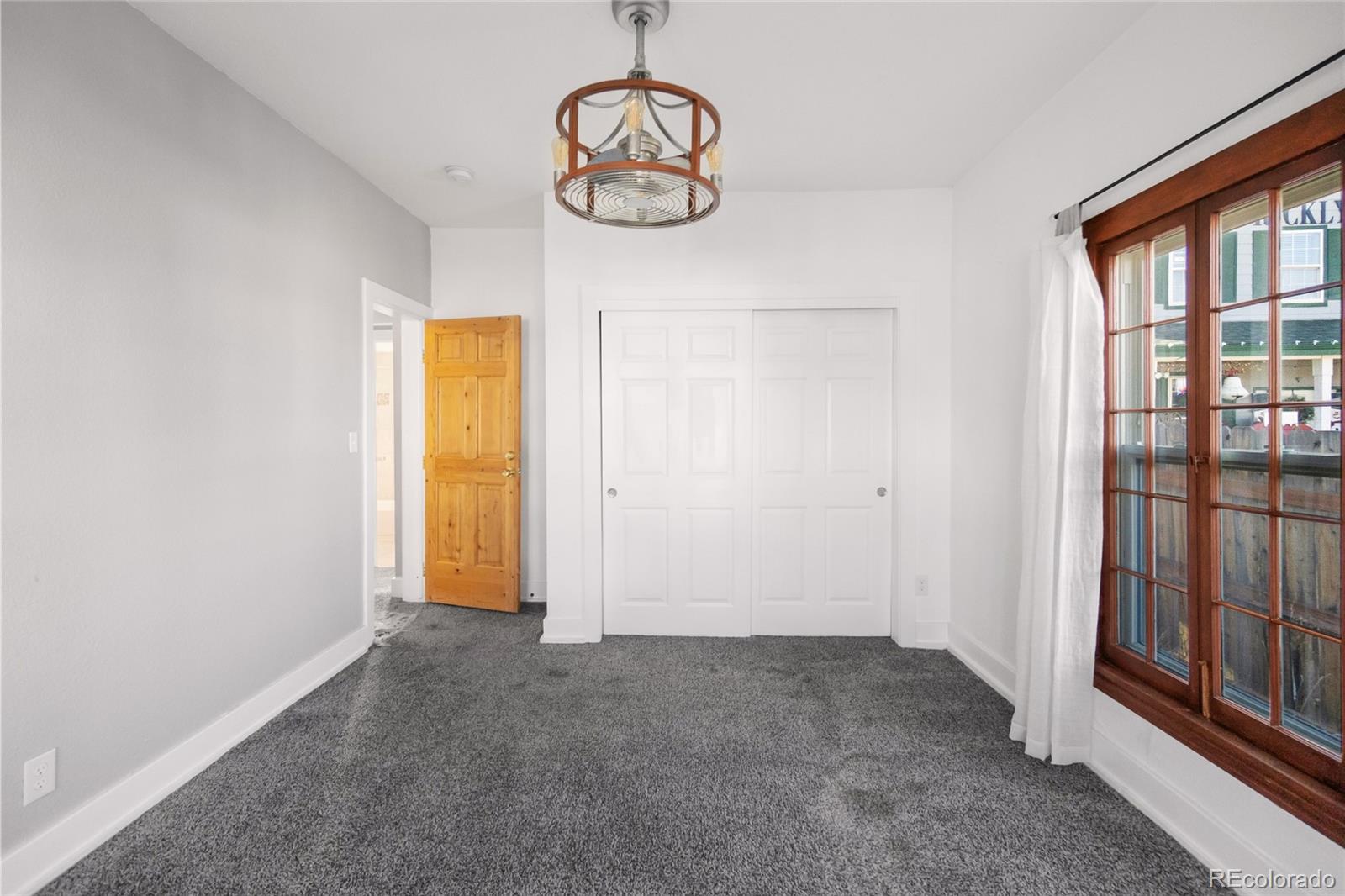 375 Main Street Elizabeth, CO 80107 - Photo 27 of 43 a view of an empty room with a window