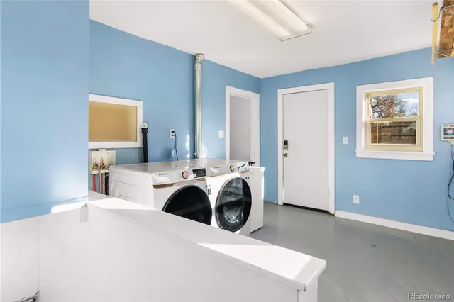 a bed room with a bed and a television