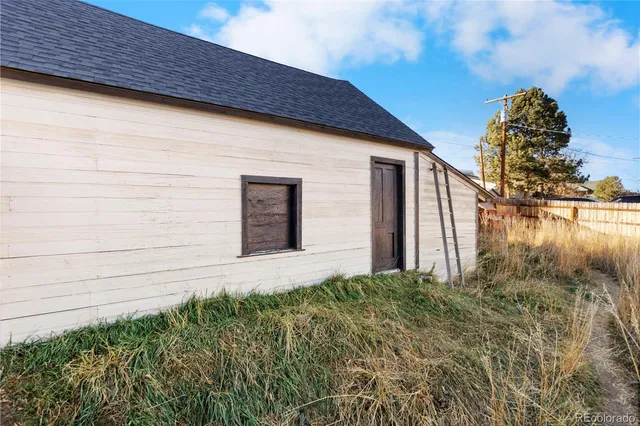 a view of a backyard of the house