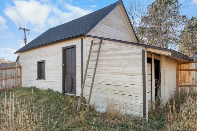 a view of a chairs on the deck