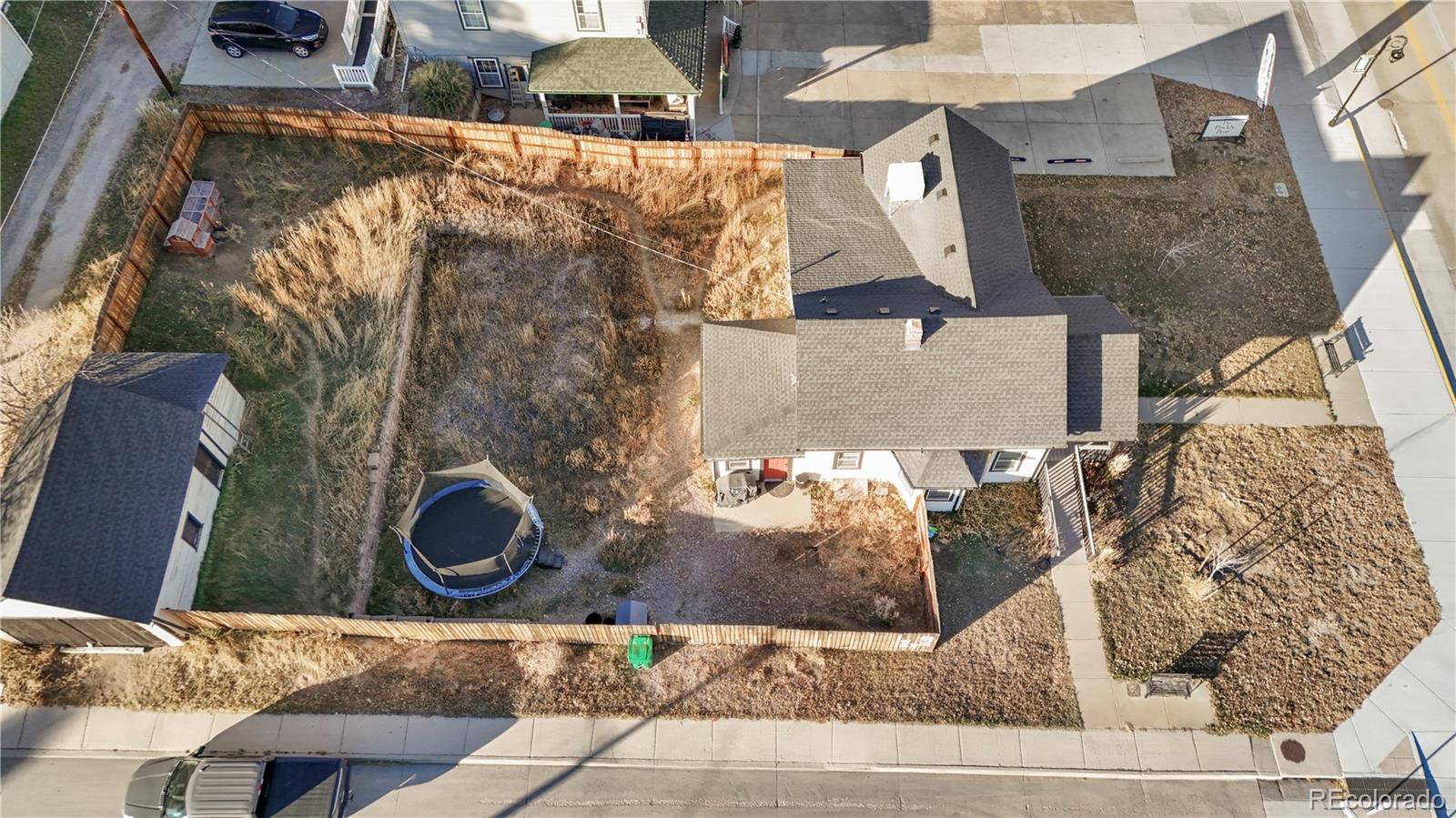 375 Main Street Elizabeth, CO 80107 - Photo 42 of 43 an aerial view of a house with a yard