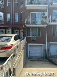 a front view of a house with large windows
