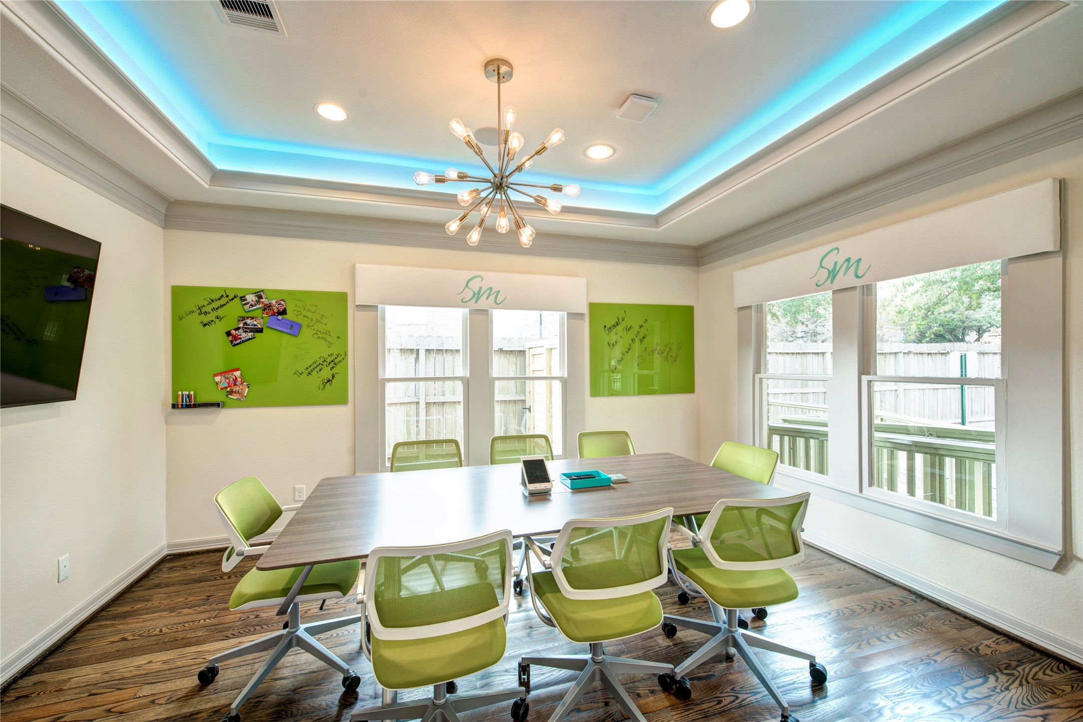 638 Heights Boulevard Houston, TX 77007 - Photo 14 of 49 a view of a dining room with furniture a chandelier and wooden floor