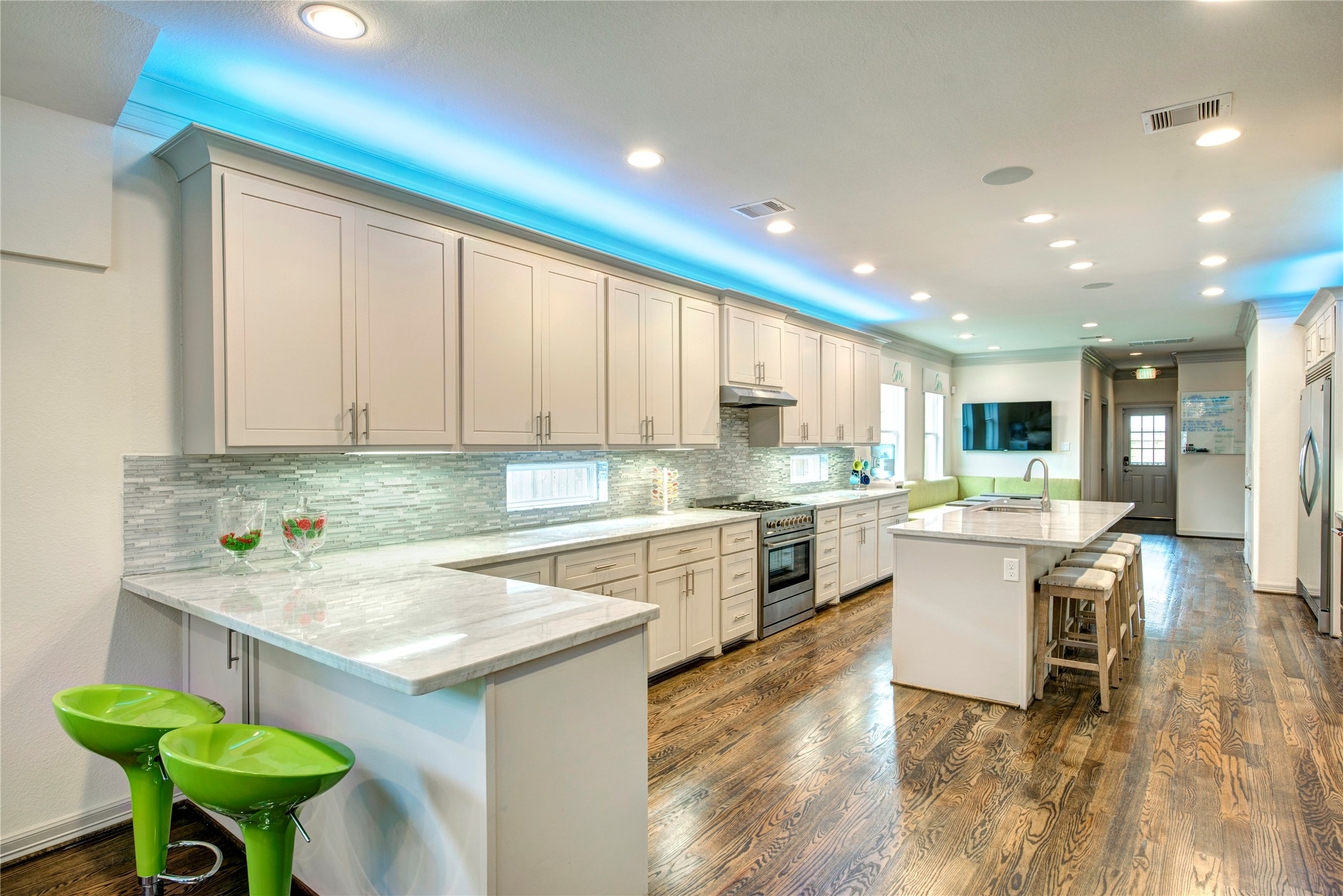 638 Heights Boulevard Houston, TX 77007 - Photo 16 of 49 a kitchen with a sink cabinets and wooden floor