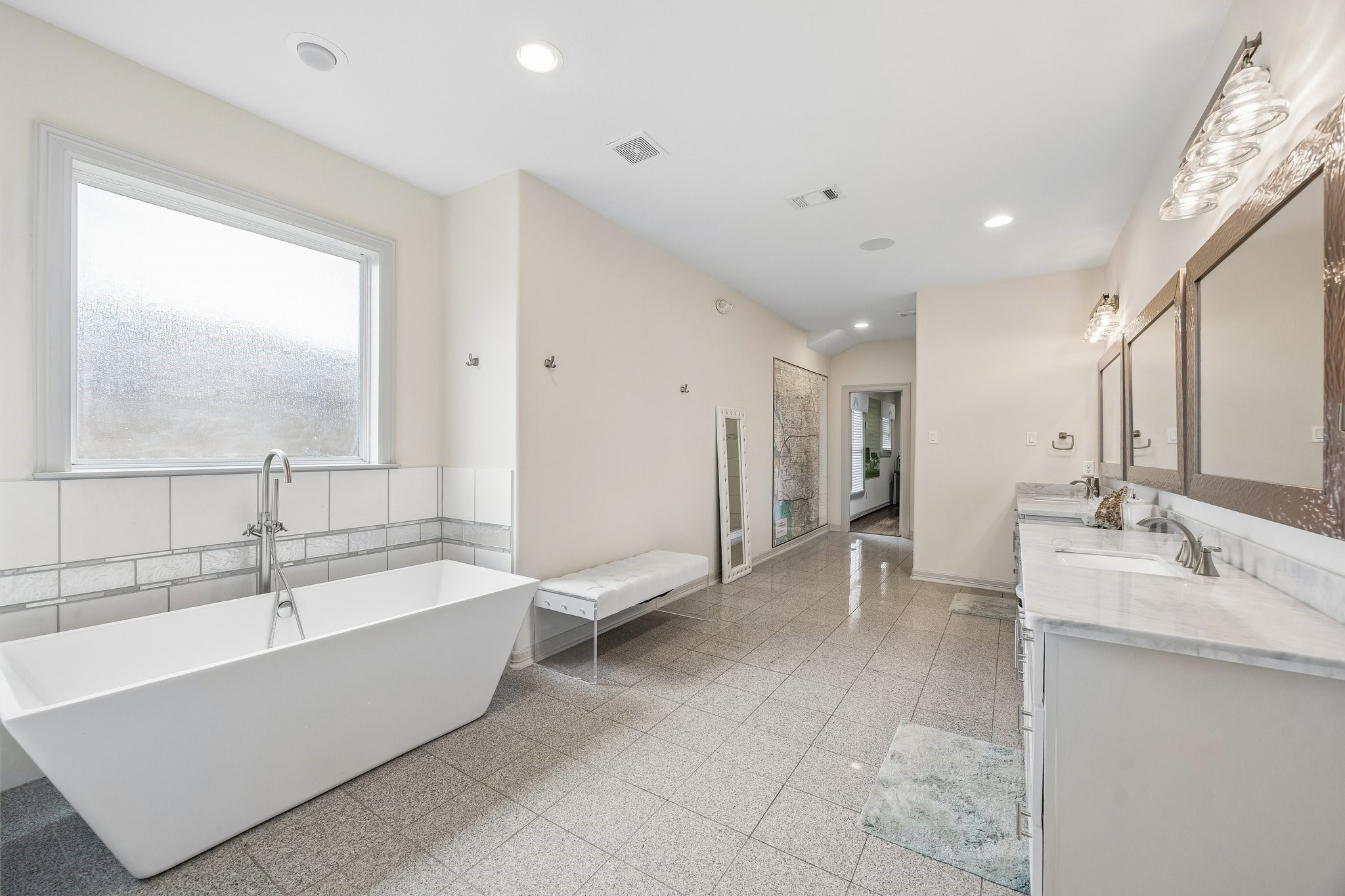 638 Heights Boulevard Houston, TX 77007 - Photo 20 of 49 a large spacious bathroom with a large tub shower and sink
