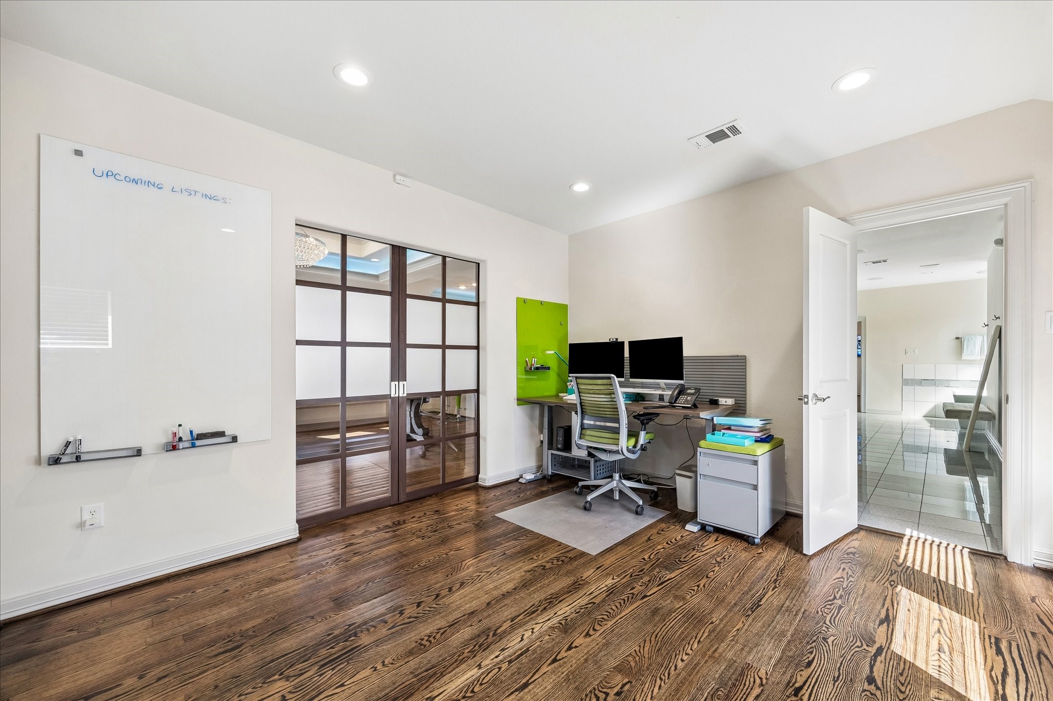 638 Heights Boulevard Houston, TX 77007 - Photo 22 of 49 a view of a workspace with furniture and a window