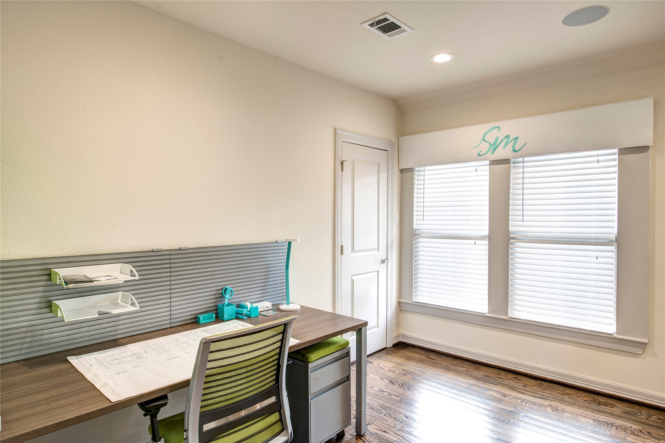 638 Heights Boulevard Houston, TX 77007 - Photo 28 of 49 a view of a workspace with furniture and a window