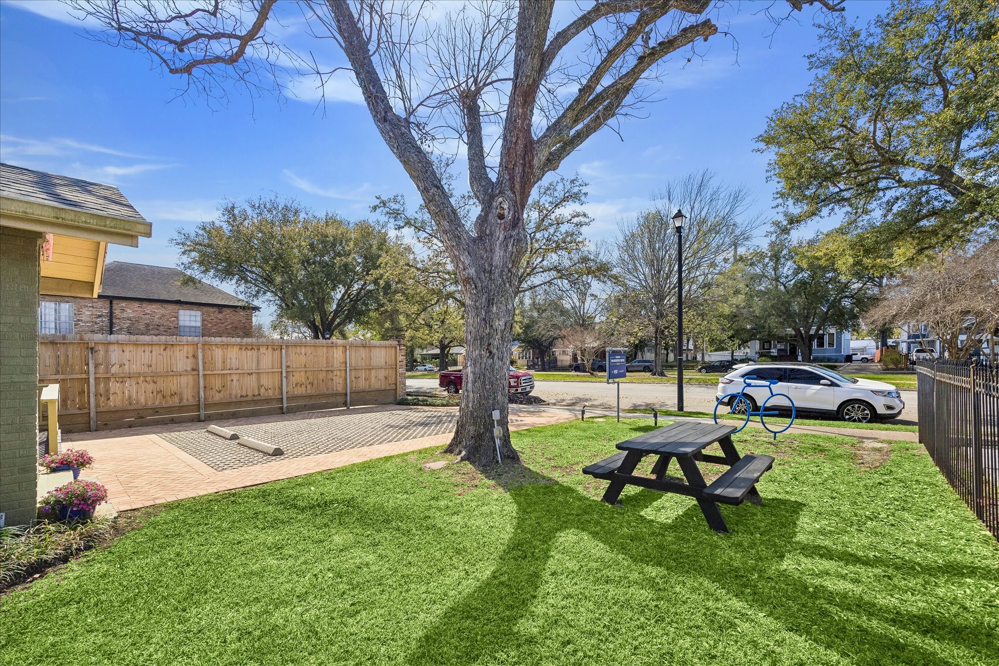 638 Heights Boulevard Houston, TX 77007 - Photo 7 of 49 Plenty of front lush, green, front yard complete with picnic table underneath a mature pecan tree.