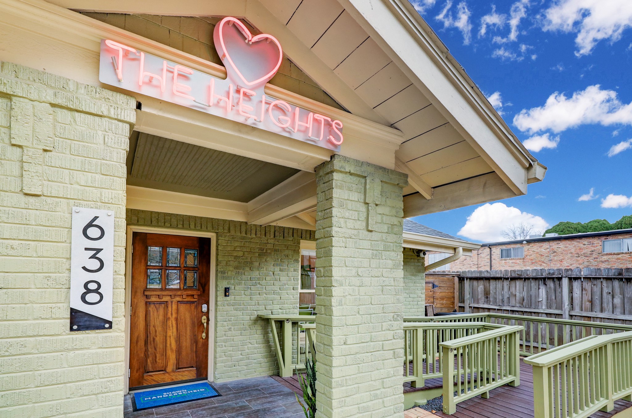 638 Heights Boulevard Houston, TX 77007 - Photo 9 of 49 The covered front porch offers charm and accessibility, complete a convenient ramp. It’s a welcoming first impression that blends character with everyday functionality.