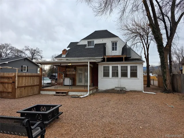 a backyard of water with palm trees