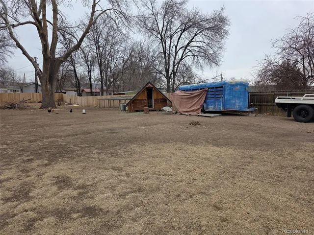 a view of a backyard of the house