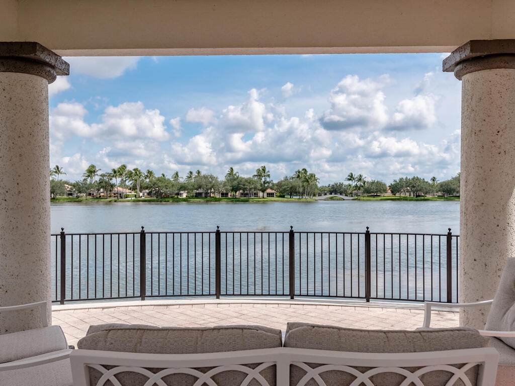 3074 Futuna Lane Naples, FL 34119 - Photo 27 of 28 a backyard of a house with wooden floor