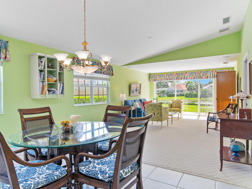 3074 Futuna Lane Naples, FL 34119 - Photo 5 of 28 a view of a dining room with furniture window and outside view