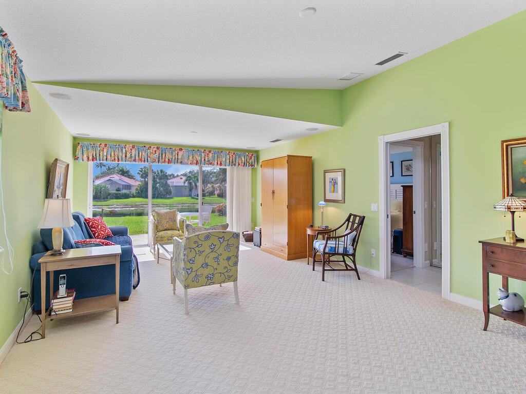 3074 Futuna Lane Naples, FL 34119 - Photo 10 of 28 a living room with furniture and a large window