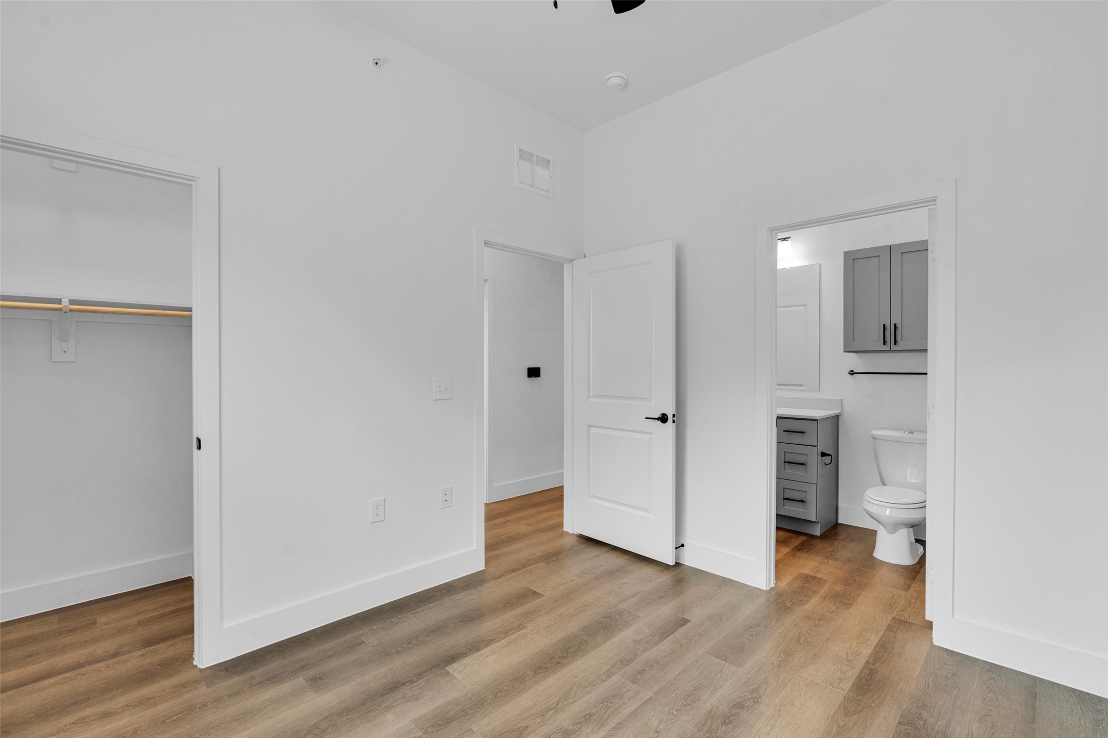1621-204 Bernard Street Rowlett, TX 75089 - Photo 15 of 31 a view of a kitchen with wooden floor and a sink