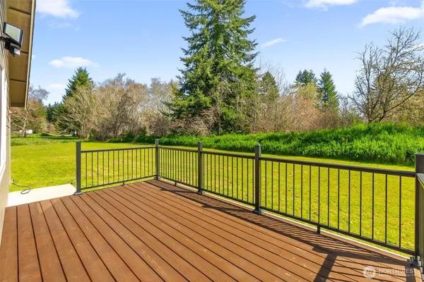 a view of balcony with wooden floor