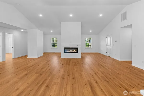 a view of a livingroom with wooden floor