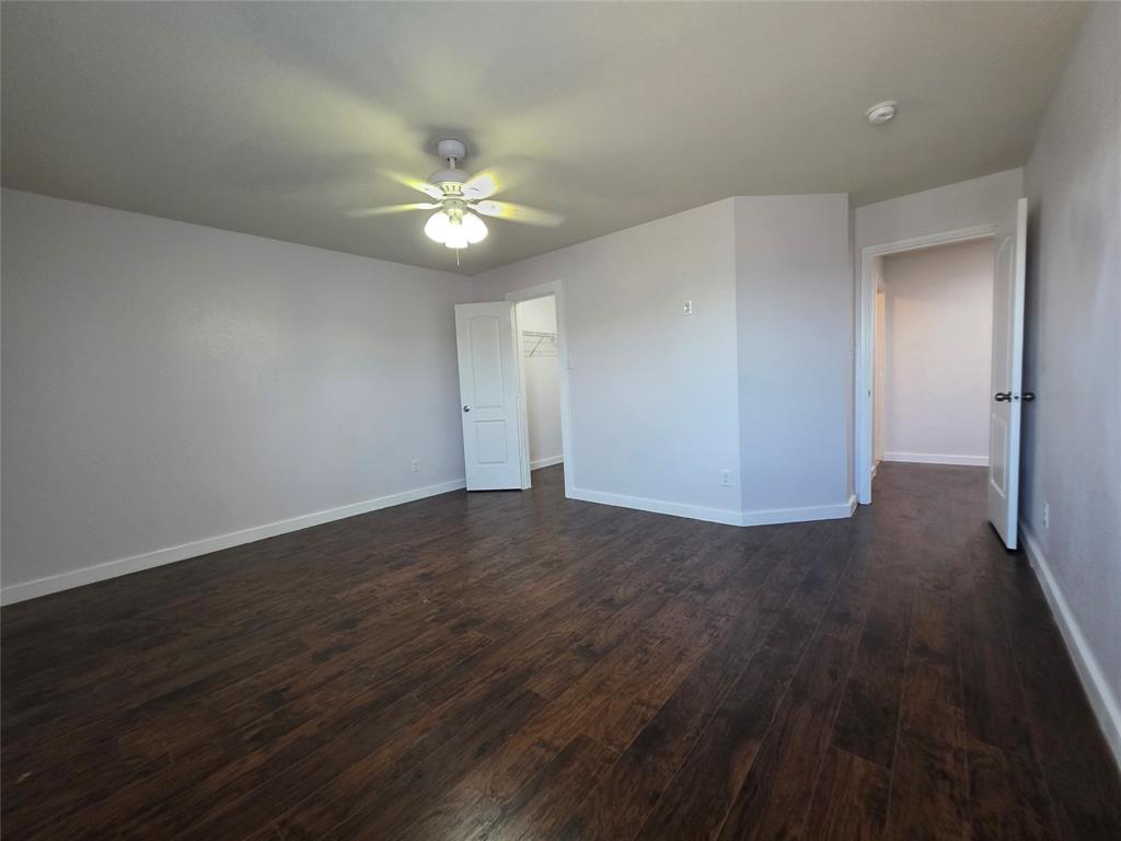 149 Ryan Street Anna, TX 75409 - Photo 22 of 38 a view of an empty room with wooden floor