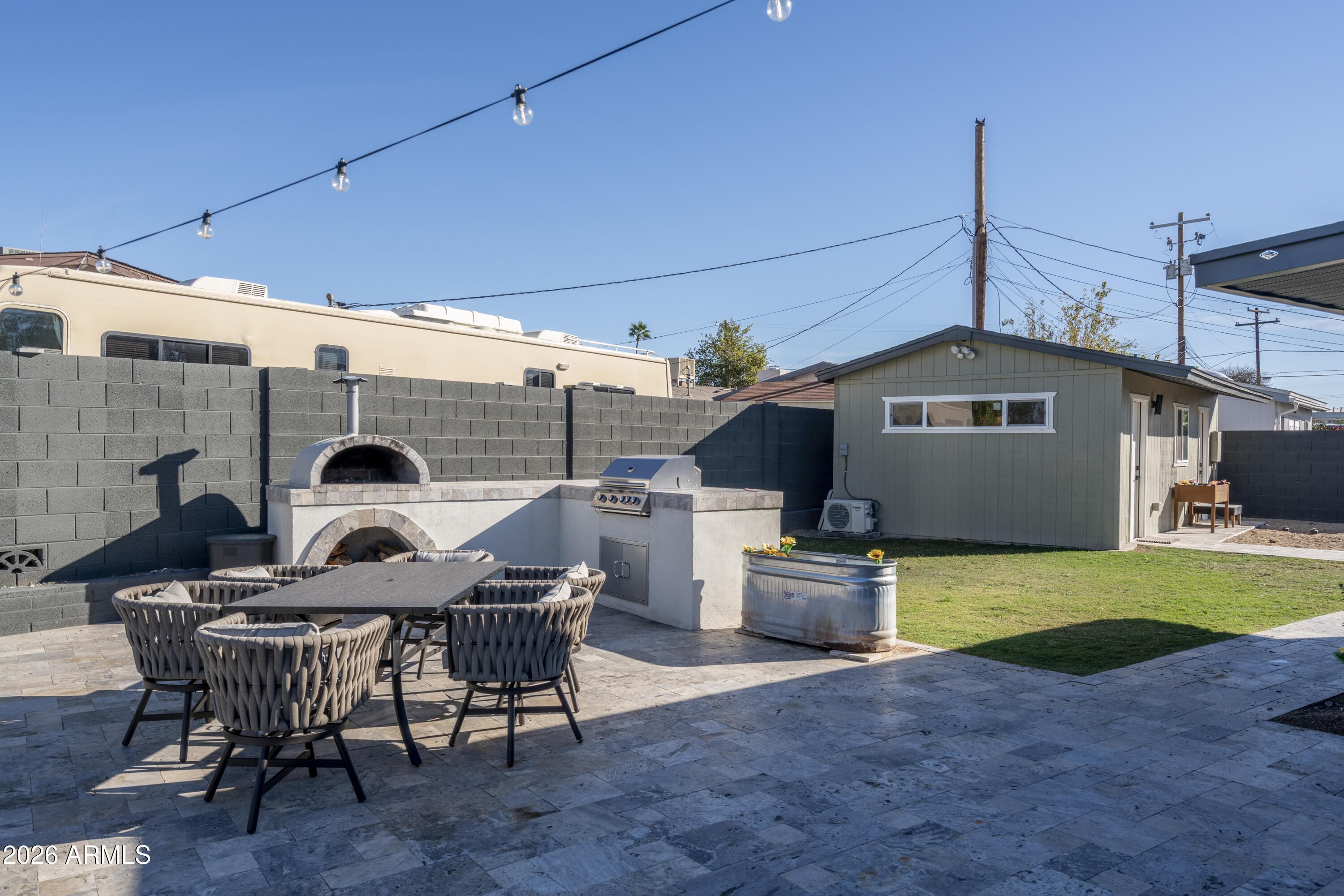 8049 North 10th Street Phoenix, AZ 85020 - Photo 13 of 40 a view of a patio with a table and chairs