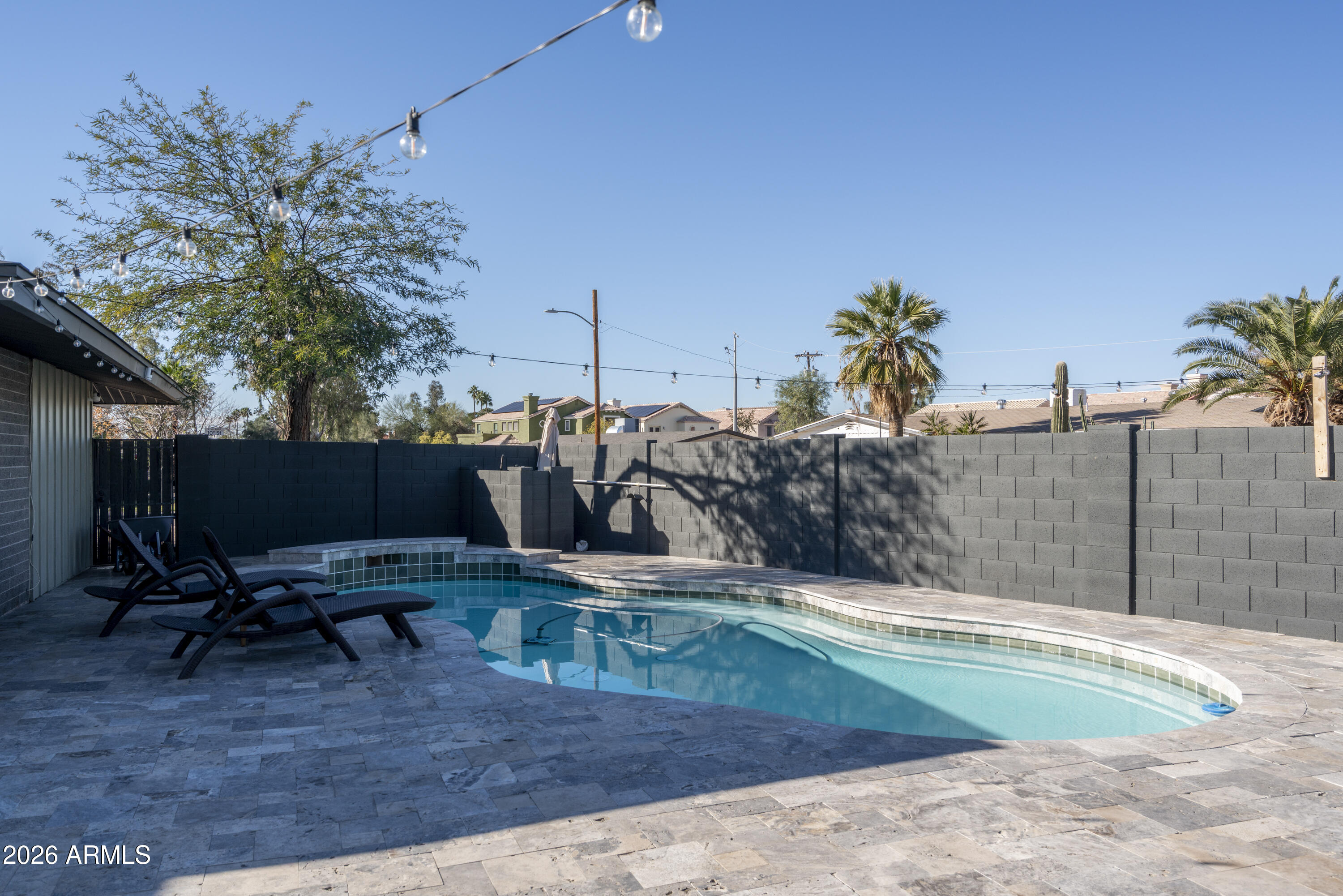 8049 North 10th Street Phoenix, AZ 85020 - Photo 33 of 40 a view of a backyard with plants and a patio