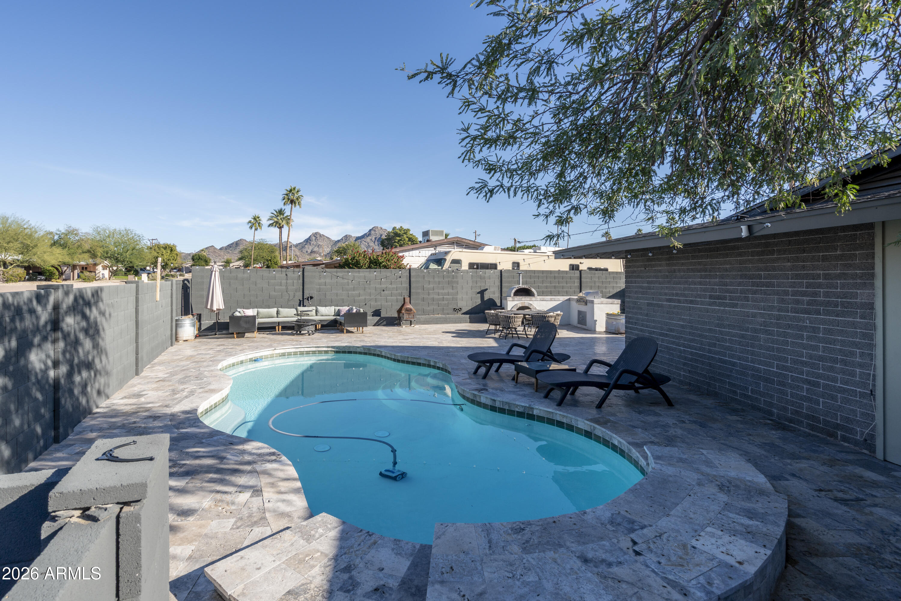 8049 North 10th Street Phoenix, AZ 85020 - Photo 34 of 40 a view of a backyard with sitting area