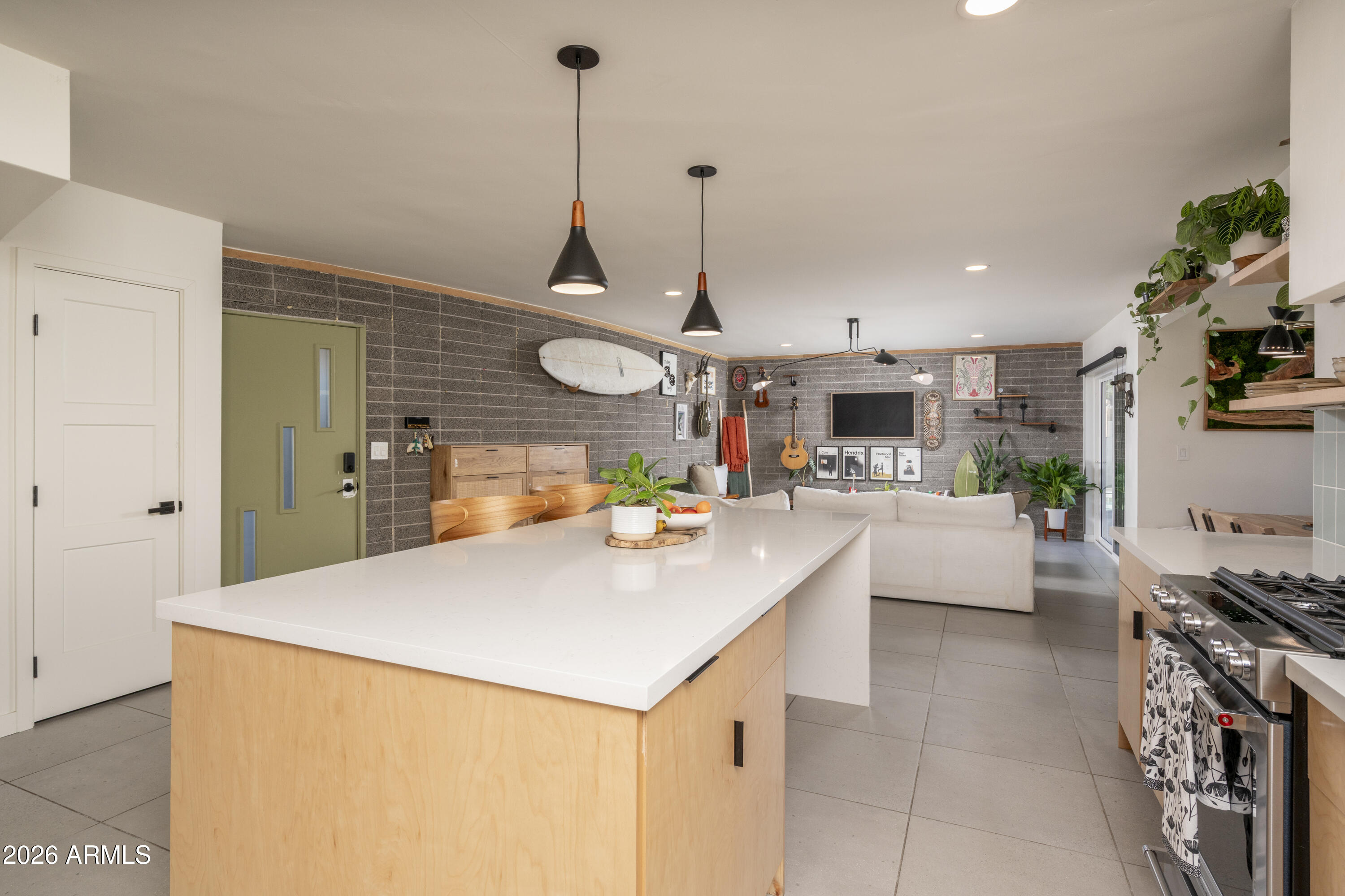 8049 North 10th Street Phoenix, AZ 85020 - Photo 4 of 40 a view of kitchen and living room