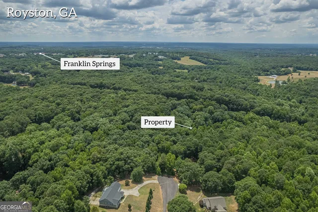 a view of a yard with an outdoor space