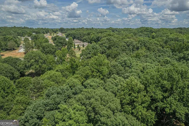 a view of a backyard of the house