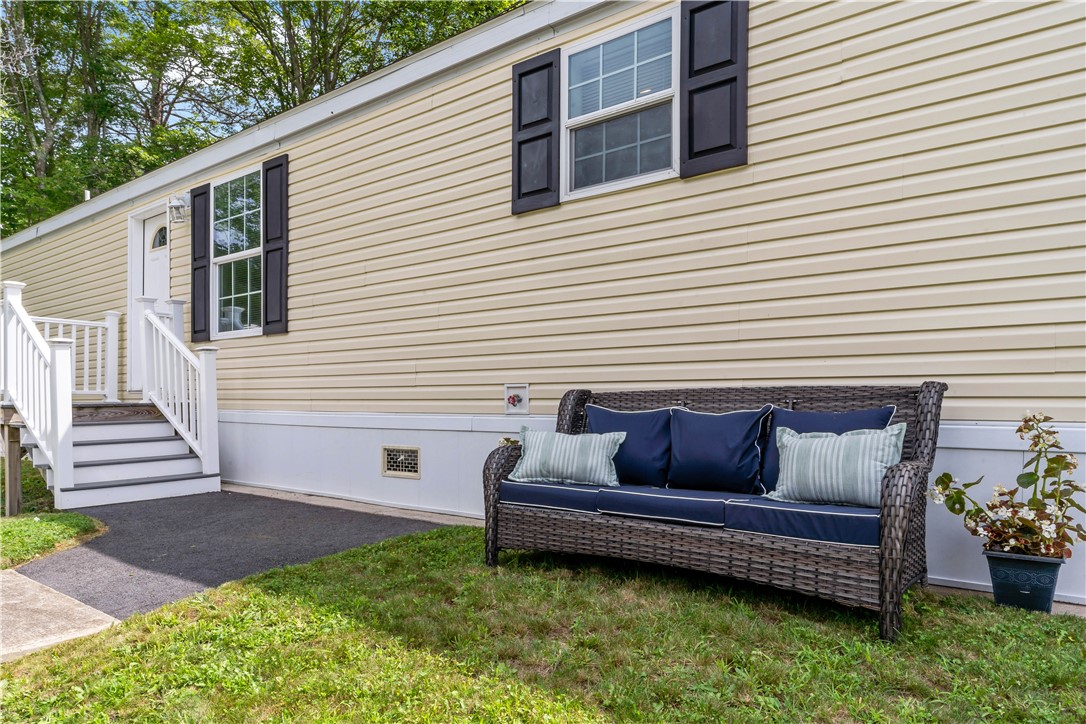 38 Diamond Hill Road Glocester, RI 02814 - Photo 34 of 38 FRONT yard wicker sofa does not convey