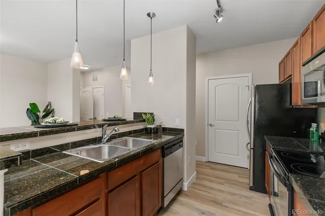 a spacious bedroom with a bed and a window