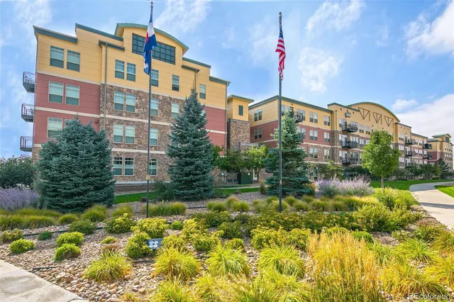 a front view of a building with street view