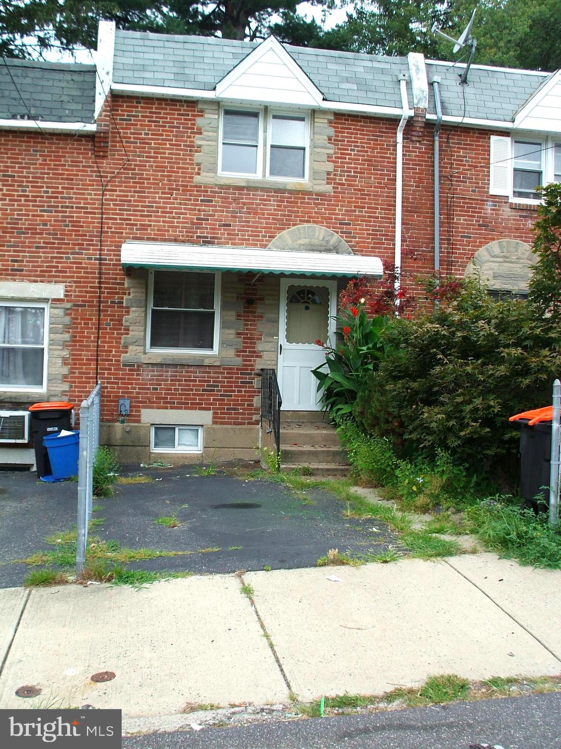 319 Rural Avenue Chester, PA 19013 - Photo 1 of 21 Exterior Brick Front & 1 Car Driveway Parking