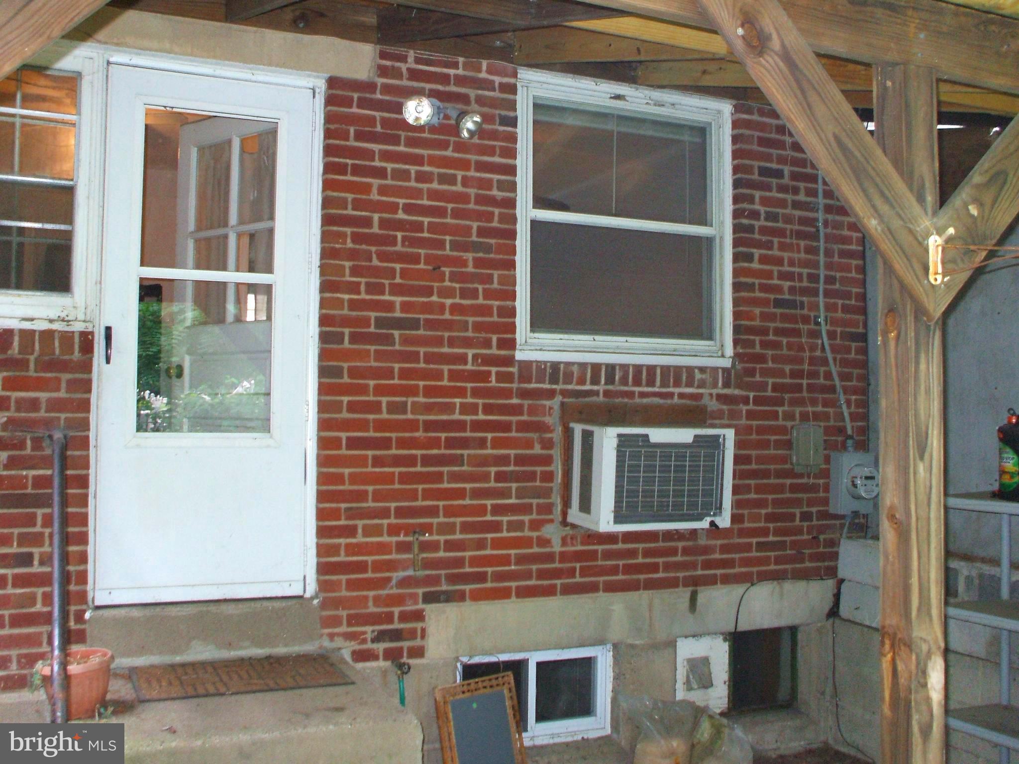 319 Rural Avenue Chester, PA 19013 - Photo 15 of 21 Covered Backyard Patio