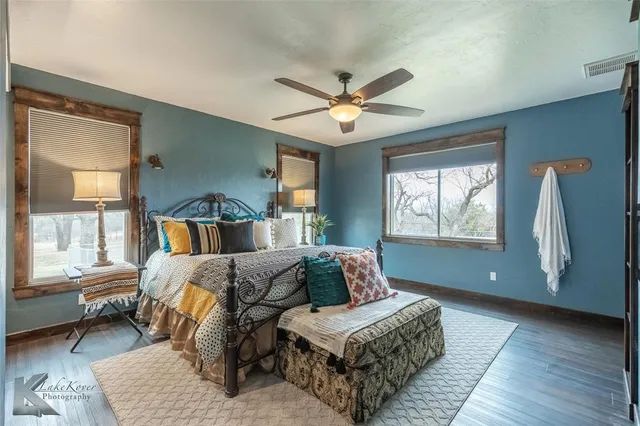 a bed room with a bed and a window