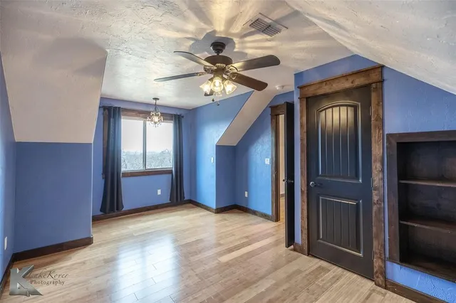 a view of an entryway with a carpet