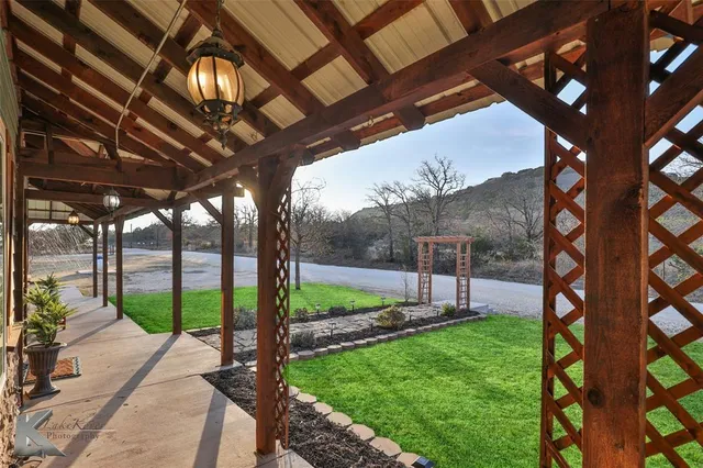 a view of a porch with a backyard