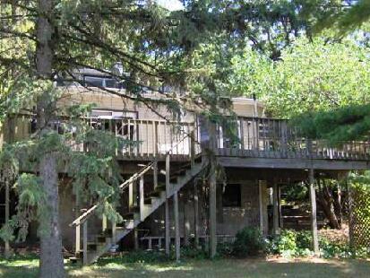 1452 River Road South Elgin, IL 60177 - Photo 1 of 1 a front view of a house with a tree