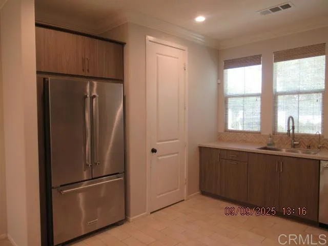 a vase of flowers sitting on a table