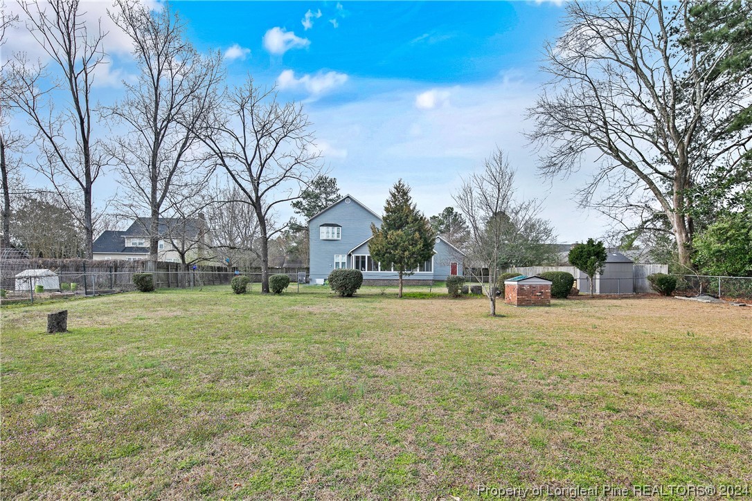636 Pleasant Loop Fayetteville, NC 28311 - Photo 40 of 40 a house with trees in front of it