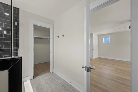 a view of an empty walk in closet