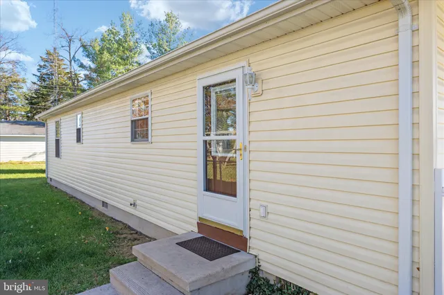 a view of a back yard of the house