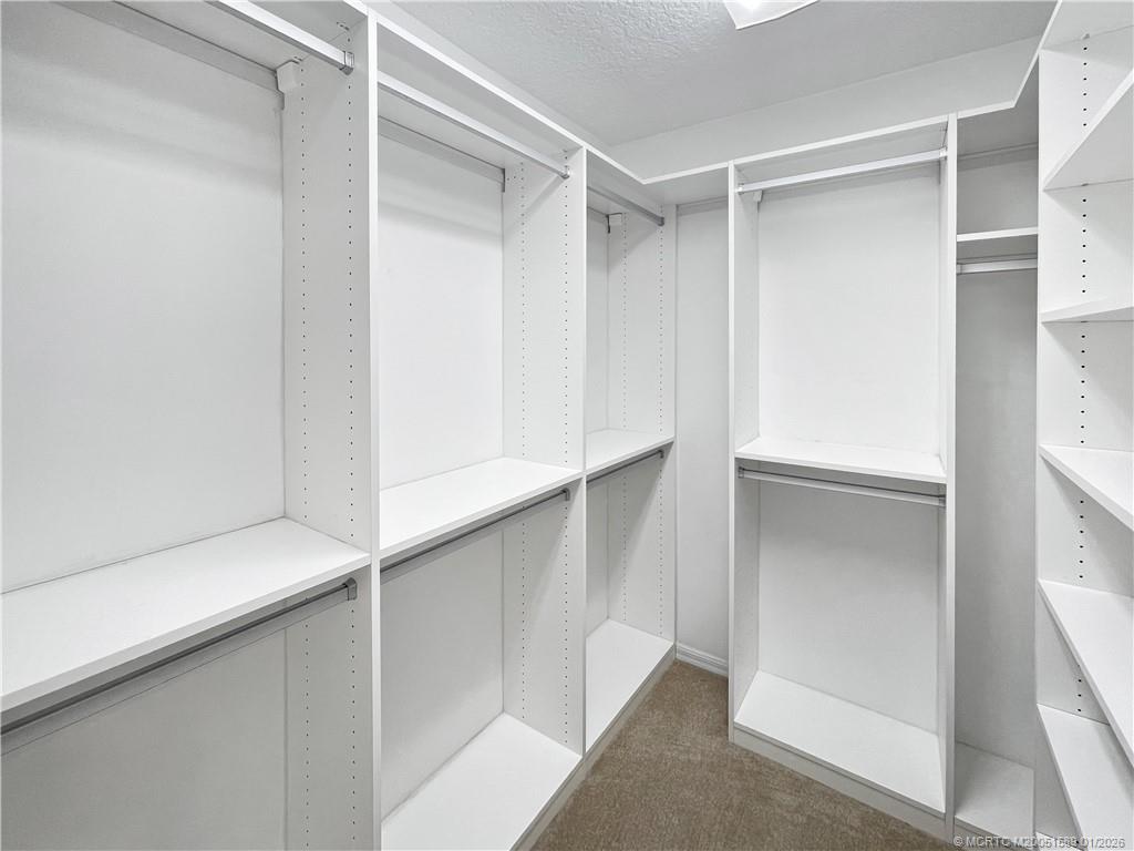 8006 Southwest Yachtsmans Drive Stuart, FL 34997 - Photo 12 of 42 a view of an empty walk in closet
