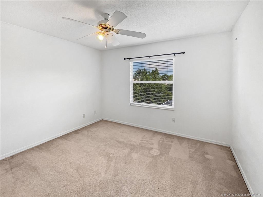 8006 Southwest Yachtsmans Drive Stuart, FL 34997 - Photo 17 of 42 an empty room with a window