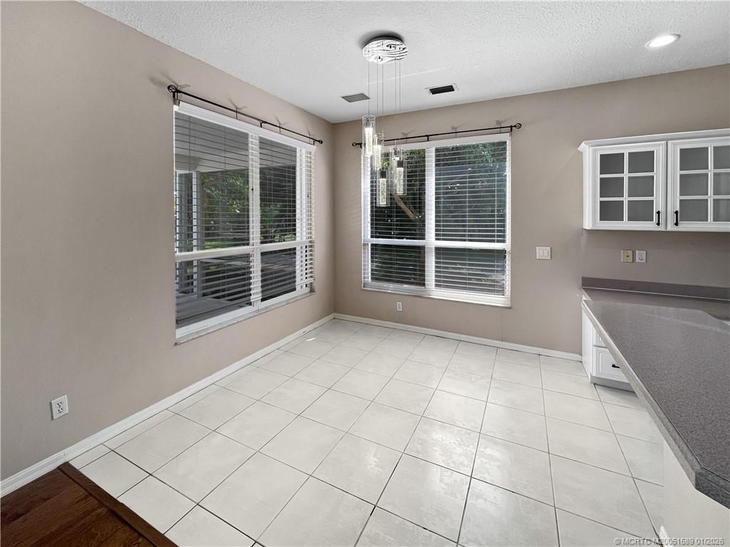 8006 Southwest Yachtsmans Drive Stuart, FL 34997 - Photo 24 of 42 a view of an empty room with a window