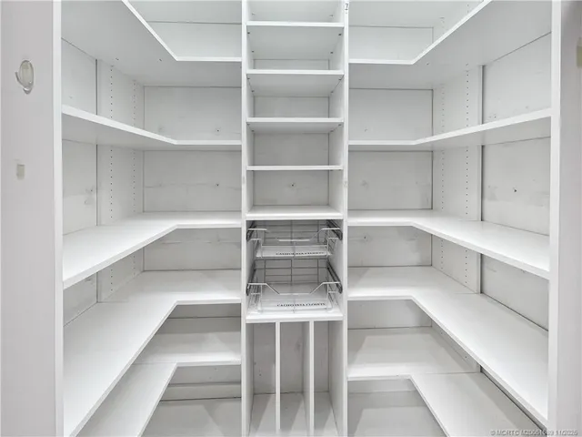 a view of a room with shelves