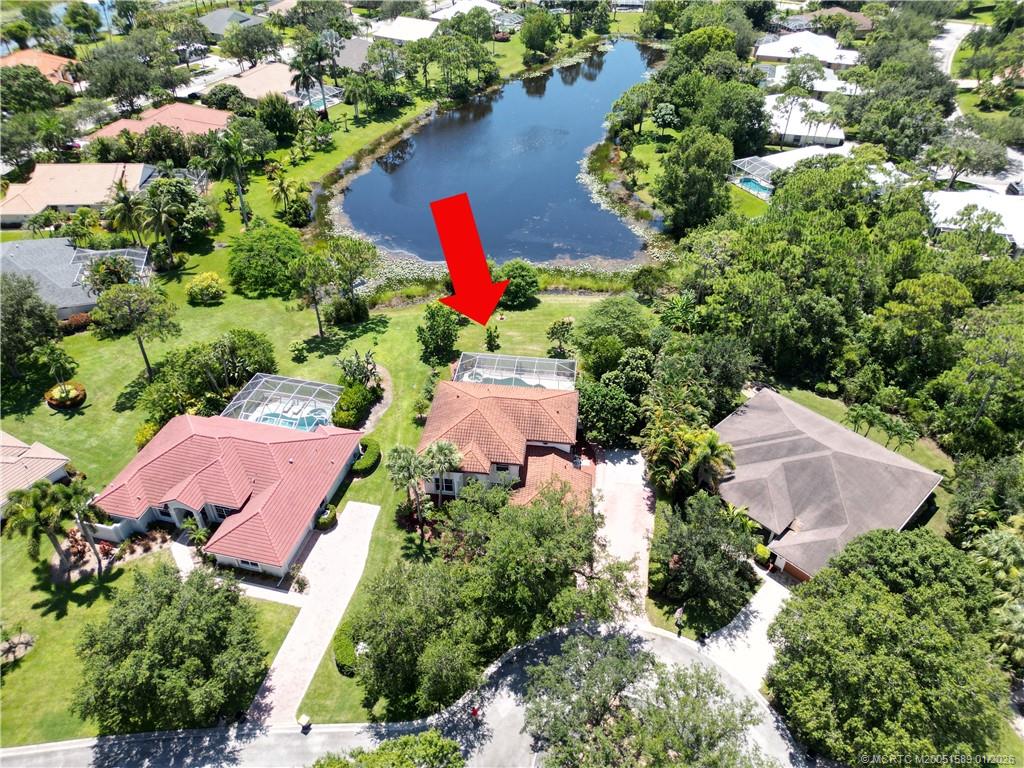 8006 Southwest Yachtsmans Drive Stuart, FL 34997 - Photo 3 of 42 an aerial view of house with yard