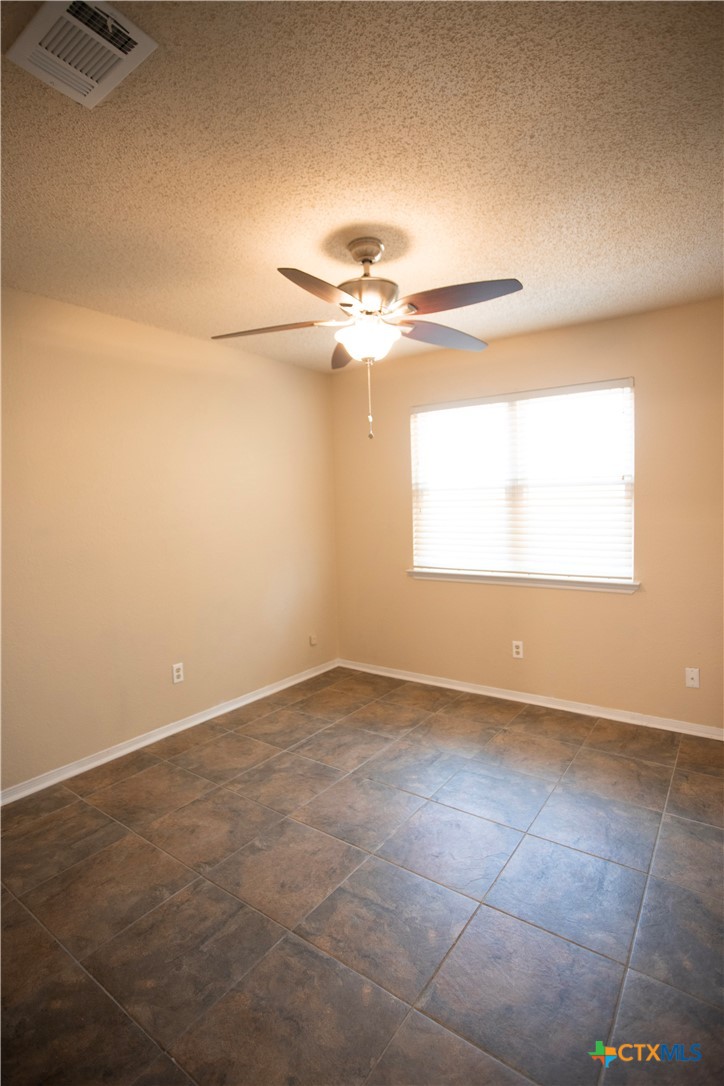 712 Brazos Drive Temple, TX 76504 - Photo 20 of 28 a view of an empty room with a window