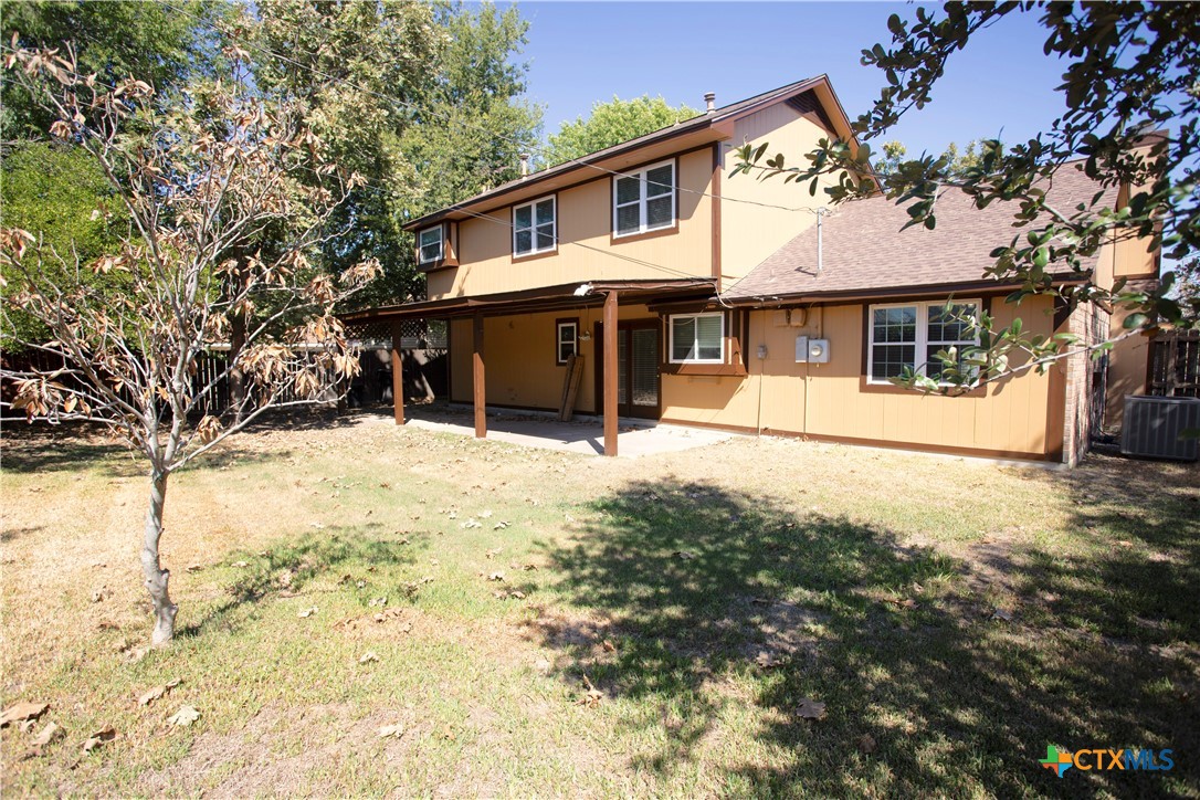 712 Brazos Drive Temple, TX 76504 - Photo 25 of 28 a front view of a house with a yard covered in snow